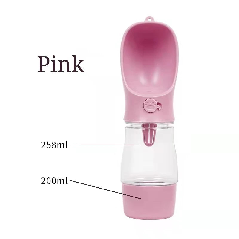 Pink portable pet water bottle with measurement labels on a white background